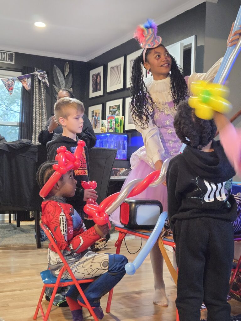 Balloon twisting at kids party in Augusta GA by Brown Beauty Magic