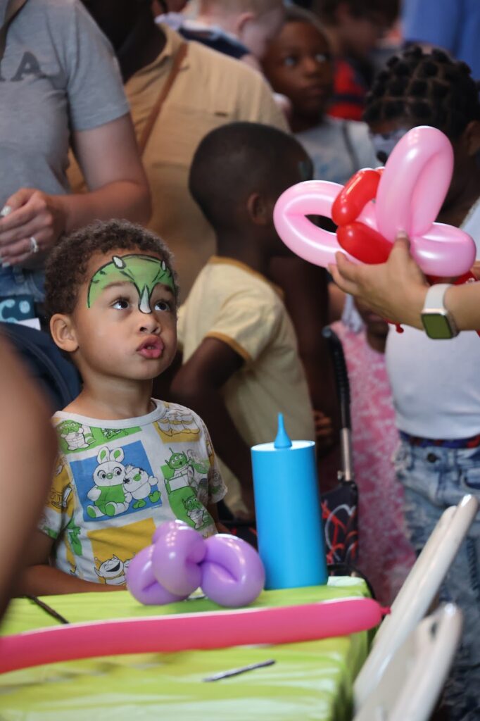 Balloon twisting at kids party in Augusta GA by Brown Beauty Magic